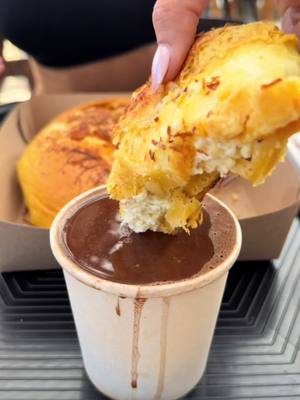 A post by @globalfoodqueen on TikTok caption: Hot chocolate and cheese bread 🧀 🍫 ##food##medellin##colombia##cheese##chocolate