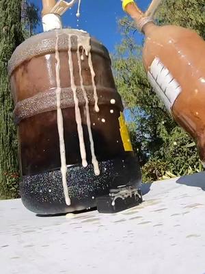 A post by @nickuhas on TikTok caption: We made it even bigger. Supersizing the classic coke and mentos geyser experiment! #cokeandmentos #sciencexperiment #scienceismagic @@stevespangler @Mattrege 