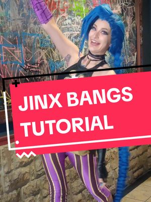 A post by @sugarvail on TikTok caption: Jinx wig tutorial - BANGS ONLY #jinx #jinxarcane #cosplay #jinxcosplay #jinxwig #wigtutorial #jinxwigrestoration #arcane #arcanecosplay