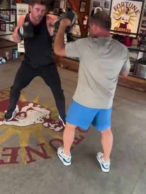 A post by @chrishemsworth on TikTok caption: Thanks for the workout Justin! The knowledge from this man is incredible. #boxing #fitness 