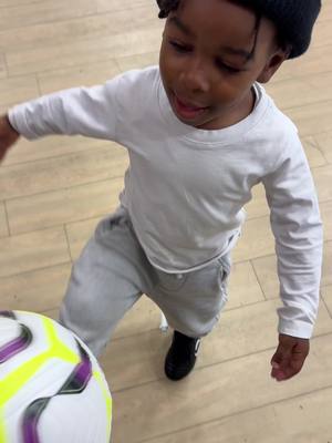 A post by @raisingzion1 on TikTok caption: New boots⚽️ #toddlertok #toddler #cutetoddler #cute #football #footballtraining #funnytoddler #funnytoddlervideos #funny #funnyvideos #broski #dad #son 