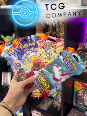 A post by @bindyrooz on TikTok caption: Pokemon pack opening part 1 ⚡️ packs #gifted by @TCG Company 🩵  #pokemon #pokemontcg #pokemonpackopening 