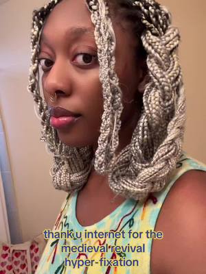 A post by @girlp0ster on TikTok caption: these are gonna be hard to take down, i’ve essentially elaborately tangled my braids #medievalrevival #medievaltiktok 