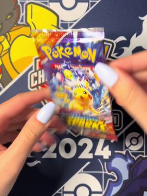 A post by @bindyrooz on TikTok caption: Pokemon pack opening part 2 ⚡️ packs #gifted by @TCG Company 🩵  #pokemon #pokemontcg #pokemonpackopening 