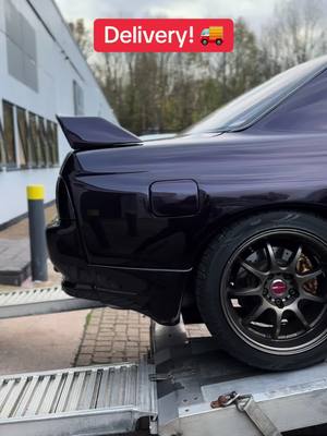 A post by @redlinecompetitions on TikTok caption: Incoming! Nissan Skyline R32 #fyp #foryoupage❤️❤️ #90skids #photography #retrocars #foryoupagе #Car #foryоu #nissanskyline #skyliner32 