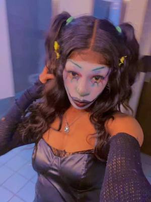 A post by @citrinecentaur on TikTok caption: #clowncore #clownmakeup #clowngirls #rave #mawlietheraveclown #mawlie #happybirthday #trending #thanksgiving #fyp #clowntown #clowns #blackalttiktok #altclownmakeup #hotclowns #alttiktok #altgirls #imnotjustabish 