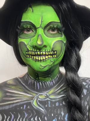 A post by @sfxaimee on TikTok caption: sassy💚 #makeup #elphabamakeup #wicked 