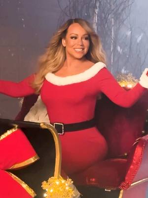 A post by @mariahcarey on TikTok caption: Celebrating #MerryChristmas30 with a new shoot and a deluxe release! #holidaymusic 