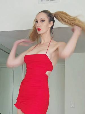 A post by @lisina15 on TikTok caption: I am just a 7ft tall woman who loves red color ❤️😊