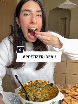 A post by @healthygirlkitchen on TikTok caption: WOW. Add PUMPKIN to your spinach artichoke dip🧡🌱!! #SimpleMillsPartner  What ya need:  1 tbsp olive oil 1 tbsp minced garlic 1 20 oz bag frozen spinach  1 can artichoke hearts, drained 1 package silken tofu 1 cup pumpkin puree 1 tsp pepper 1 tsp salt 1 tsp sage 1 pinch nutmeg 1/2 cup vegan mozzarella 1/4 cup vegan parmesan  Crackers for dipping: @Simple Mills Himalayan Salt Veggie Pita Crackers  How to:  1. Preheat oven to 400 F. 2. In a large nonstick pan, saute garlic in oil for a few minutes on medium heat until golden. 3. Then, add the spinach and artichokes then saute for 5 minutes to cook off the moisture. 4. Add in tofu, pumpkin, spices, then mix. Add in the Mozzarella the mix again. Pour into casserole dish, sprinkle parmesan over top. 5. Bake for 25 minutes, put the oven on broil for the last 4 minutes or until the top is a nice golden brown!  6. Pair with @simplemills crackers and you are going to be in heaven!  7. ENJOY!!!  #holidaytiktok #holidayrecipes #pumpkinseason #healthyrecipes #appetizers 