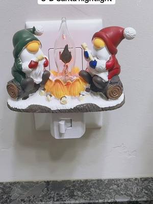 A post by @be369_963 on TikTok caption: #TAPATUUT  #ChristmasSanta3-DNightlight #Nightlight #ChristmasGnomeCampfire #PlugArt #ChristmasEssentials #