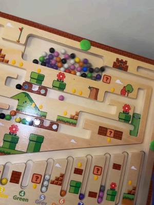 A post by @aminaahamadii on TikTok caption: This is an amazong maze board that helps yur kids stay off of electronics.#busyboard #finemotorskills #finemotoractivity #smartboard #parentingtips #parentinghacks #educational #playtime #maze #learning 