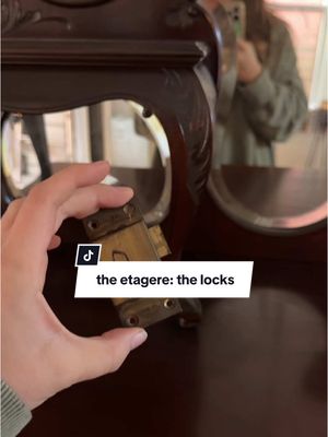 A post by @sophiemariegraf on TikTok caption: Decided to start by looking at the hardware to try and date the etagere…and the locks are from the UK?! #thrifted #victorianera #antiques 