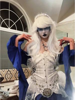 A post by @st1.ches on TikTok caption: ❄️ #christmaslooks #goth #demiboy #ftm #lgbt #mlm #ilovemybf #drag #dragmakeup 