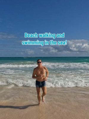 A post by @ronnyellis2929 on TikTok caption: Beach walking and cooling off in the sea is amazing!!! #beachwalk #beach #beachvibes #puntacana #ocean #sea #therapy #fun #happy