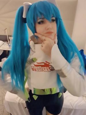 A post by @grabbinlegs on TikTok caption: when you get exhausted at the con and come back to the hotel room to meme by yourself #hatsunemiku #hatsunemikucosplay #racingmiku #cosplay 