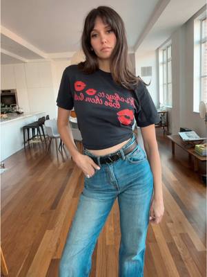 A post by @nina on TikTok caption: GRWM merch edition. Here’s how styled my Tshirt for an afternoon in NYC 😉 show me yours! I want to see how you work it into an outfit 🫶🏻