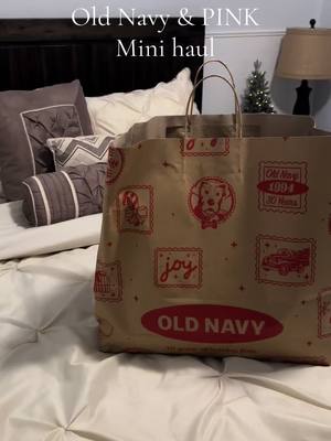 A post by @http.julievargas on TikTok caption: Little haul ❄️ #shoppinghaul #viral #christmas #haul #girlyfinds #winterfashion #babytok #PINK #oldnavy 