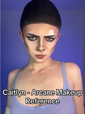 A post by @spilllthetea on TikTok caption: Caitlyn - Arcane Makeup Reference (bald edition) 🧁 I would absolutely adore to try Vi’s next 👀 #caitlyn #caitlynarcane #caitlynkiramman #arcane #makeup 