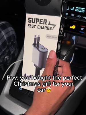 A post by @surge_store.com on TikTok caption: One of best purchases for my car! #fyp #charger #TikTokShop #cargadgets #caraccessories #retractablecharger 