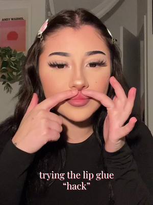 A post by @mari4eliana on TikTok caption: trying the lip glue hack for fake lip fillers… i feel like 5min crafts in this bih #makeup #makeuphacks #makeuptutorial #lipcombo 