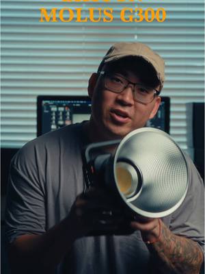 A post by @hanminpaek on TikTok caption: POWERFUL AND SMALL The @ZHIYUN Molus G300 + 90D Parabolic Softbox Some of my favorite features: -The compact form factor -Color temperature -Cooling system -Zhiyun app to better accessibility  -This 300w light can also do a max brightness of 500w I need more of these @Zhiyun-tech Official  Highly recommend if you want something compact and affordable #zhiyun #contentcreator #lighting #cinematography #cinema #creator #creative #gaffer