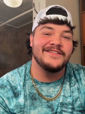 A post by @dustinmartinarnol on TikTok caption: Hair id getting wild!!! #longhairdontcare #chaingang #smilemore #mullet #wings #ohio 