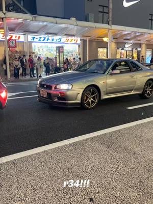 A post by @nikolaysemenenko on TikTok caption: Found in the wild, Kyoto #R34 #nissan #jdmcar 