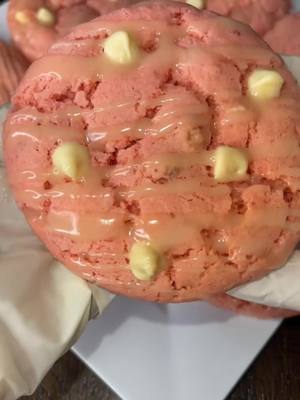 A post by @kay.gorg on TikTok caption: White chocolate chip Strawberry cookies  Ingredients  - Strawberry Cake Mix  - Eggs  - Oil  - Cream cheese icing  - White chocolate chips  - Freeze dried strawberries  Cookie  - To a bowl add your cake mix  - Add two eggs  - Add 1/2 cup of oil  - Mix well until doughy  - Add 1/2 cup of white chocolate chips  - Add two bags of freeze dried strawberries  - Mix well until well combined  I did melt the cream cheese Icing for 30 secs just cause it was so thick I do recommend melting just 10-15 secs vs full 30 just so color wouldn’t change  Bake in oven on 350 10-12 mins cook longer for a well done cookie  Enjoy 😊  #fyp #trending #foodies #sweets #strawberry #cookie #kaikyianna #cooknwkaikyianna #cooknwkai 