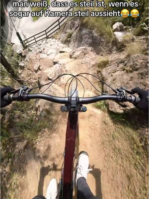 A post by @oli.fbs on TikTok caption: man weiß, dass es steil ist, wenn es sogar auf Kamera steil aussieht😂😂 @houseofbikes #mtb #mtblife #mtblifestyle #downhill #freeride #enduromtb 