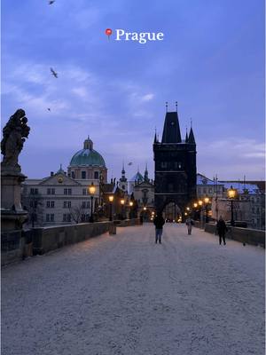 A post by @travelwithveronicca on TikTok caption: Best advice I can give you if you're visiting Prague this winter — wake up early and thank me later. 🙂 #visitprague #praha #charlesbridge #praguecity #praguetravel 