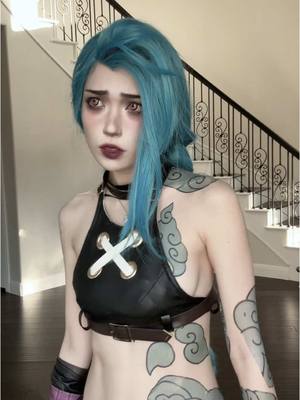 A post by @emiru on TikTok caption: this is the only other tiktok i made as jinx #arcanecosplay #jinxcosplay