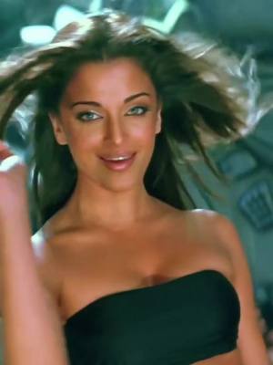 A post by @bollywood_hits.songs on TikTok caption: She's stunning!! 🔥🖤 . . #crazykiyare #dhoom2 #aishwaryarai #hrithikroshan #bollywood #bollywoodsong #foryou #fyp #explore  #بولیوود #ايشواريا_راي 