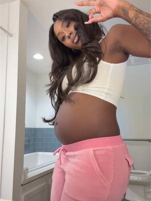 A post by @flomillishit on TikTok caption: #pregowhere #heavyonthebloated  TEAM Girl or Boy ? 👀💖💙