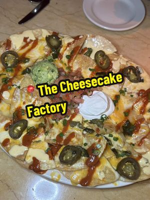 A post by @2truefoodies on TikTok caption: Head to The Cheesecake Factory this holiday season to buy a $50 gift card, and get a $15 bonus, now through 12/31! @The Cheesecake Factory @Dr Pepper #CheesecakeFactoryPartner #ad #DrPepper #DrPepperFan