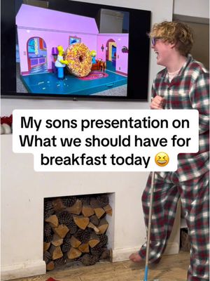 A post by @theharfinfamily on TikTok caption: AD| My son’s presentation on what we should have for breakfast today 😂   Fin used the new range of The Simpsons toys from Jakks Pacific to put together this stop motion presentation. It was so good, how could I say no?!   The Simpsons Toys are now available from: The Simpsons - Amazon #christmastoys #toys #doughnutsforbreakfast