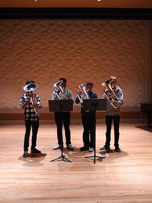 A post by @bostoncrusaders on TikTok caption: "The Christmas Song" featuring BACBrass member Jaden Overbeck and the UNT Euphonium Studio. #bostoncrusaders #euphonium