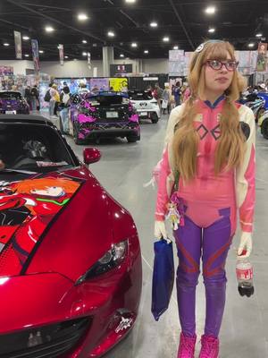 A post by @_ohbunny on TikTok caption: asuka car or something #asuka #asukalangley #marimakinami #mariillustriousmakinami #evangelion #cosplay #awa24 