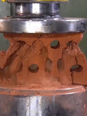 A post by @hpc_official on TikTok caption: Hydraulic Press vs. BRICKS #satisfying #crush #press #asmr