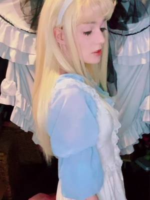 A post by @discount.yam on TikTok caption: New content??? Holy shit?????? #discountalice #aliceinwonderland #alicecosplay #cosplayer #aliceinwonderlandcosplay #cosplay 