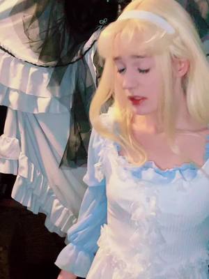 A post by @discount.yam on TikTok caption: I love Alice so fucking much you guys dont understand #discountalice #aliceinwonderland #alicecosplay #cosplayer #aliceinwonderlandcosplay #cosplay 