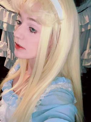 A post by @discount.yam on TikTok caption: #discountalice #aliceinwonderland #alicecosplay #cosplayer #aliceinwonderlandcosplay #cosplay 