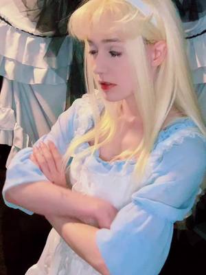 A post by @discount.yam on TikTok caption: My sweet bean widdle baby i love her sm #discountalice #aliceinwonderland #alicecosplay #cosplayer #aliceinwonderlandcosplay #cosplay 