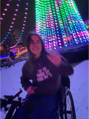 A post by @zeezee25 on TikTok caption: ⚠️ lights | wheelchair users hopping on this trend 🌈🪩💅 VD: 5 young adult wheelchair users take part in a dance trend. The camera bounces between them to the beat of the song whilst they pose. Then the camera flips to each person and one pair individually. They all repeat the same dance moves whilst the camera moves to the movement of the dance moves. The dance moves are: pushing hands away from the body with palms to the camera, 2 pushes on each side to the beat of the song, hands together at the fingertips with arms parallel moving up the body and then over the head, whilst the camera makes one smooth movement following the hands, and then arms bent and moving the arms up and down as if running to the beat of the song. #disabledcommunity #wheelchairuser #disabled #trends #neurodivergent 