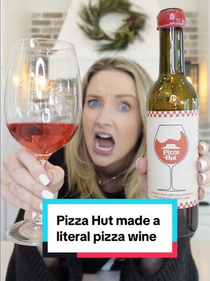 A post by @lorynpowell on TikTok caption: Talk about getting sauced. #pizzawine #winetiktok🍷 #pizzalover #pizzahut 