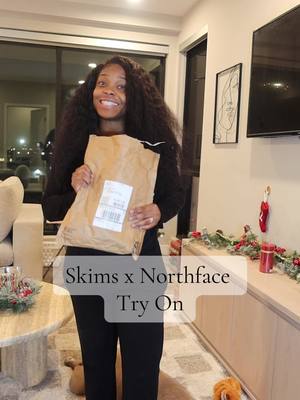 A post by @imjustrobb on TikTok caption: I like herrrr! What yall think? #skims #skimsxnorthface 