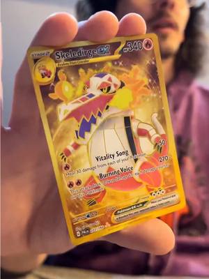 A post by @maxalinafrttv on TikTok caption: Have yall received damaged packs? Not an expensive card, but it is my first gold! #LIVEhighlights #TikTokLIVE #LIVE #pokemon #twitchstreamer #smallstreamer #pokemoncards #pokemontiktok #pokemoncommunity 