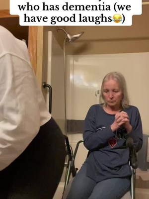 A post by @kileydelia on TikTok caption: We like to joke around before bed 😂 it makes it a little easier since most people with dementia do not like getting changed or being bothered in general, so i try to make it fun😊  #fyp #caregiver #caregiverlife #foryoupage #family #fypシ #viralvideo #funnyvideo #caregiversoftiktok #dementiacare #dementiacaregiver #dementiaawareness #getreadywithme #bedtime 