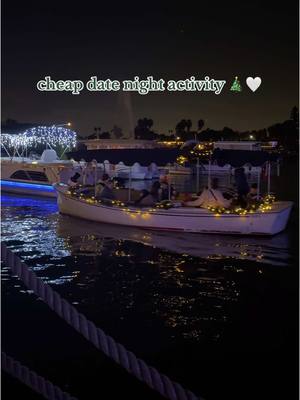 A post by @giannaelenaa on TikTok caption: night boat ride 🎄✨🤍🎁🎅🏼  ~  super cool cheap holiday activity idea!! + only $5 entry for the winter wonder land at @LakehouseResort san marcos ~ #sandiego #california #socal #trythis #holidays #christmas #winter #lights #christmasdecor #boatride #sanmarcos #holidayfun #cheap #xmas 