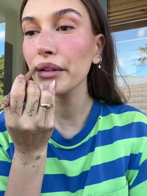 A post by @haileybieber on TikTok caption: yes chef 🙇🏼‍♀️ @rhode skin 